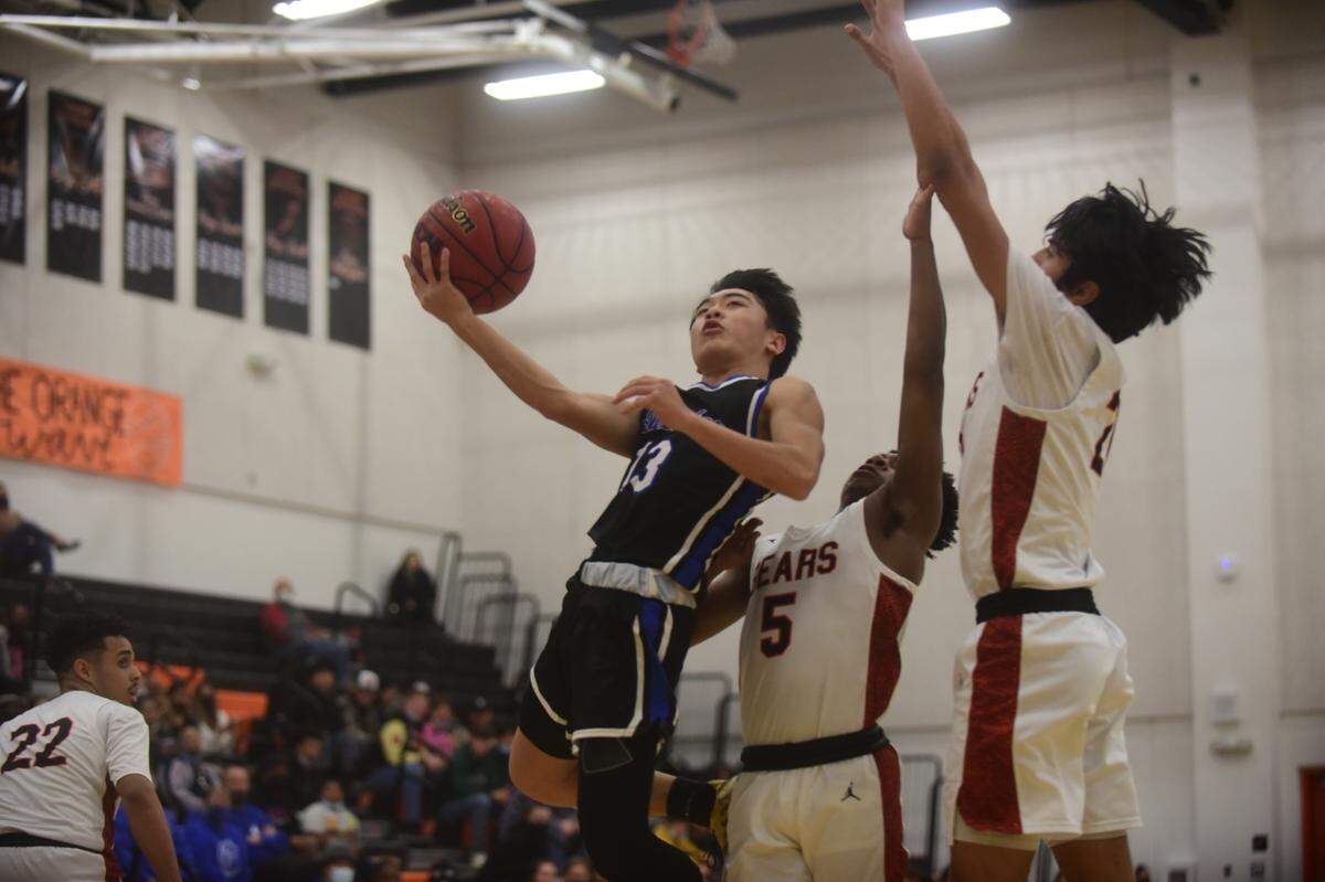Atwater High sophomore Khoi Nguyen goes up for a shot against Merced during a game on Wednesday, Feb. 2, 2022 at Merced High School.