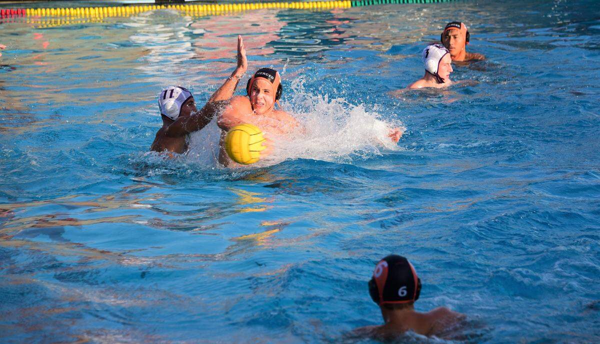Merced High sophomore Easton Hamm fires a backhanded shot during a playoff game against Johansen on Wednesday, Nov. 6, 2019.