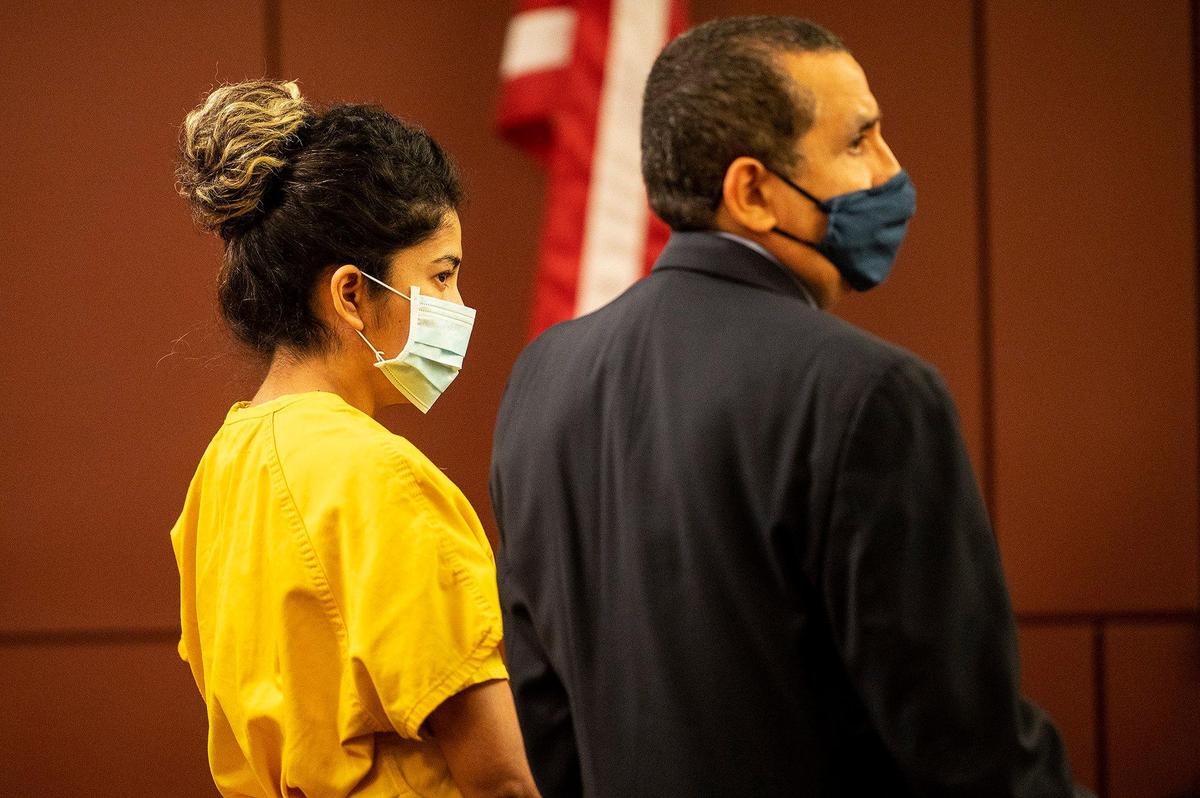 Patricia Ortiz, 30, of Le Grand, left, appears before Judge Carol Ash during an arraignment hearing at the Merced County Superior Courthouse in Merced, Calif., on Tuesday, Feb. 22, 2022. Ortiz is accused of killing her three children after their bodies were discovered in their Le Grand apartment on Jan. 12, 2022.