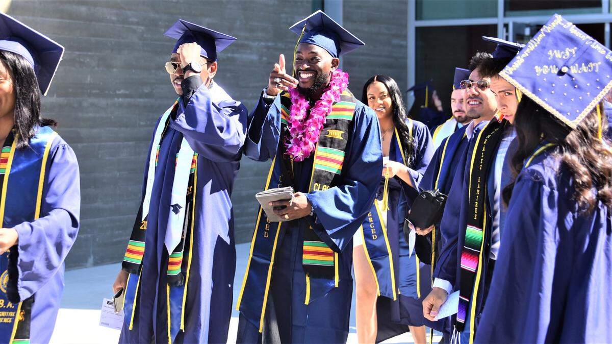 UC Merced graduates make their way to the 2022 commencement ceremony.