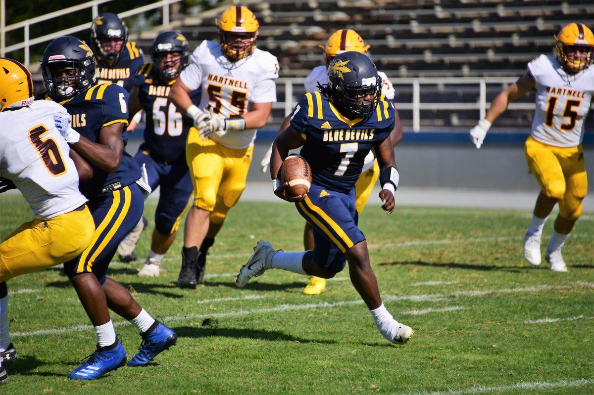 Merced College quarterback Osby Green runs the ball against Hartnell College during a game on Saturday, Oct. 26, 2019 at Stadium ’76.