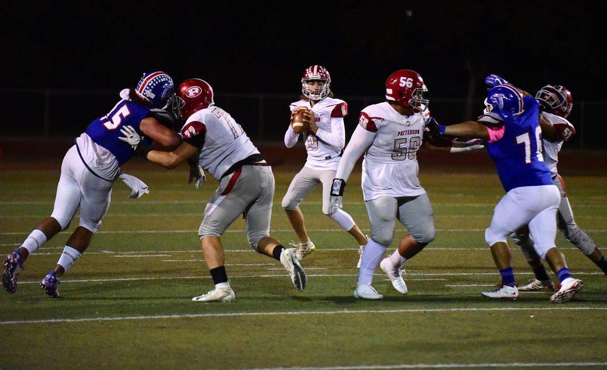 Patterson quarterback Logan McCleery drops to pass during a game against Atwater on Friday, Oct. 4, 2019 at Dave Honey Stadium.