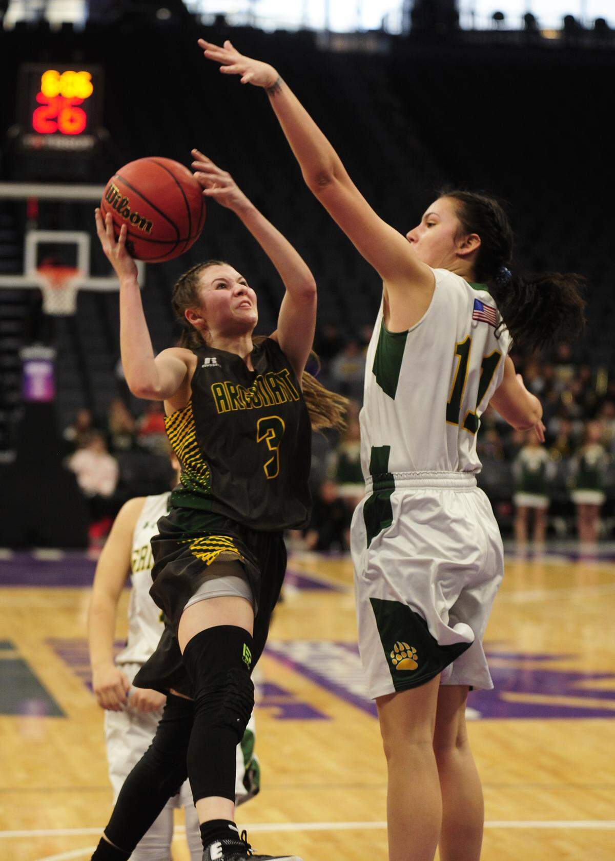 Grizzly center Alex Williams (11) looms over Argonaut’s Sophia Davis (3) for a blocked shot, during the Mariposa High vs Argonaut Sac-Joaquin Section Division V Championship at Golden 1 Center in Sacramento, on February 23, 2019. Despite a fourth quarter effort to comeback, the Mariposa Grizzlies lost to Argonaut.