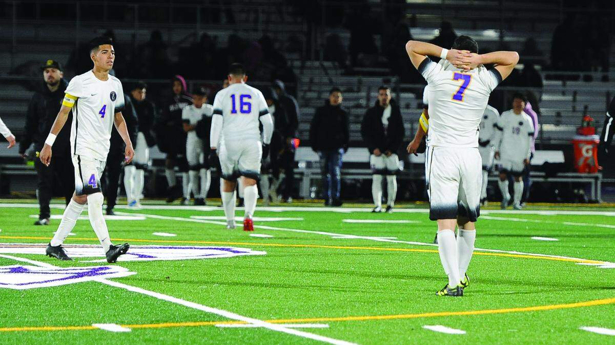BEA AHBECK/NEWS-SENTINEL Livingston react after they lost their CIF Sac-Joaquin Section Boys Division IV Soccer Championship game against Galt Thursday, Feb. 21, 2019.