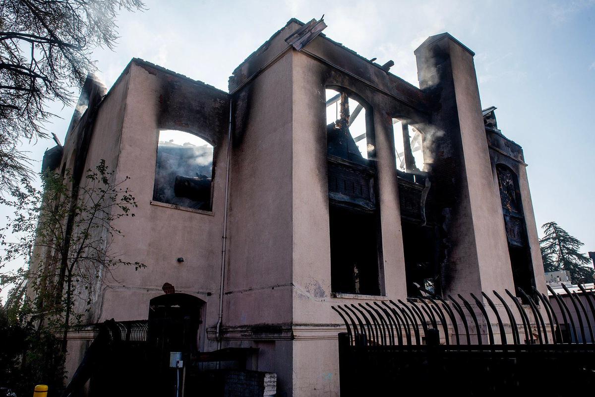 City and county fire crews respond to a structure fire at the historic Merced County High School building located at 2125 M Street in Merced, Calif., on Monday, Dec. 2, 2024. Fire officials said the cause of the fire is under investigation.