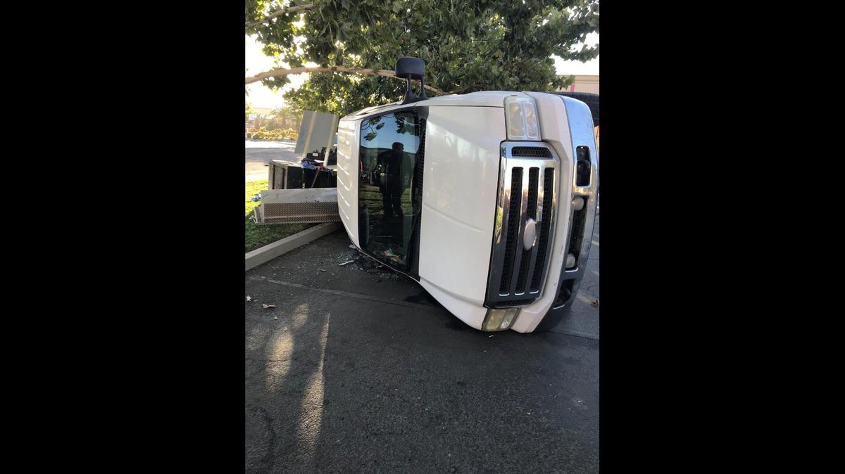 A wanted suspect and his passenger in a stolen work truck were arrested in Merced on Wednesday, following a vehicle pursuit that ended in the Smart and Final parking lot, according to the Merced Police Department. Image courtesy of Merced Police Department.