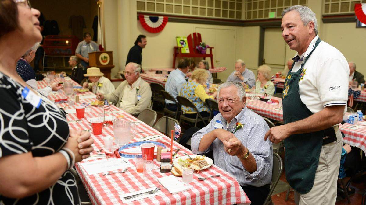 CHRISTOPHER WINTERFELDT/cwinterfeldt@mercedsunstar.com CHRISTOPHER WINTERFELDT/cwinterfeldt@mercedsunstar.com Former Merced County Sheriff Mark Pazin, right, and his father John Pazin, were pictured here during an annual Old-Timer’s Lunch held at the Italo-American Lodge on in April of 2013. The luncheon honors people who are 85 years or older, and have lived in Merced County for a minimum of 50 years.