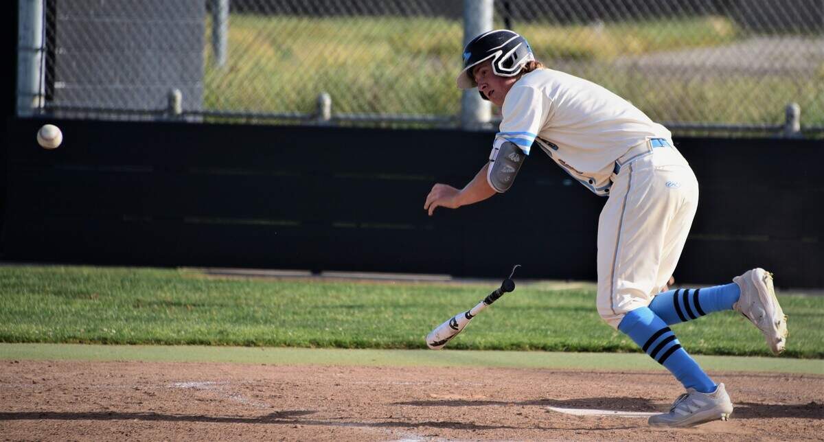 El Capitan High junior Andrew Bakken watches as he drops a bunt during a 6-2 win over Buhach Colony on Friday, April 8, 2022 at El Capitan High School in Merced, Calif.