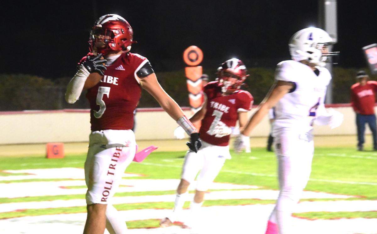 Chowchilla High tight end Rashaun Belaski (5) reacts after hauling in a touchdown pass during the Tribe’s 54-20 victory over Minarets on Friday, Oct. 18, 2024.