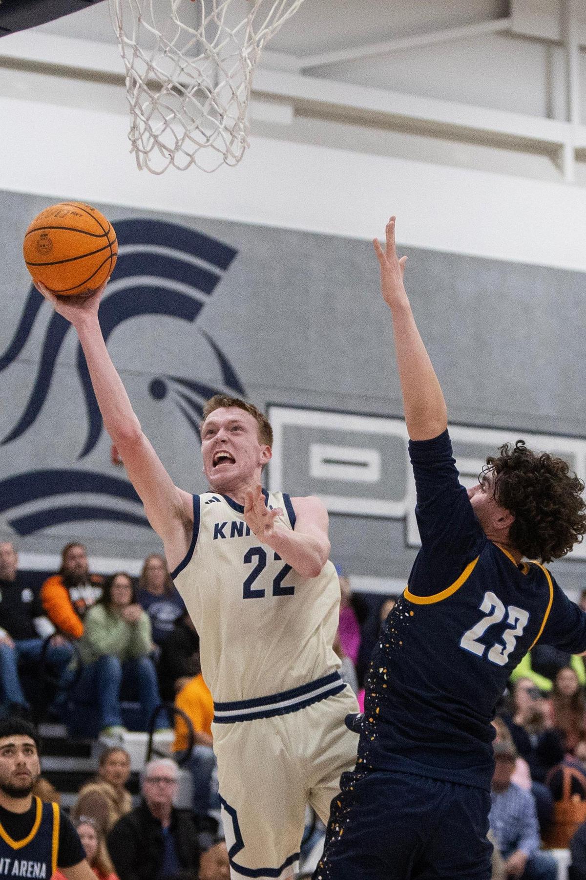 Stone Ridge Christian sophomore Tyler McCabe (22) attempts a layup during a CIF NorCal Division VI playoff game against Point Arena at Stone Ridge Christian High School in Merced County, Calif., on Wednesday, March 5, 2025. The Knights beat the Pirates 71-60.