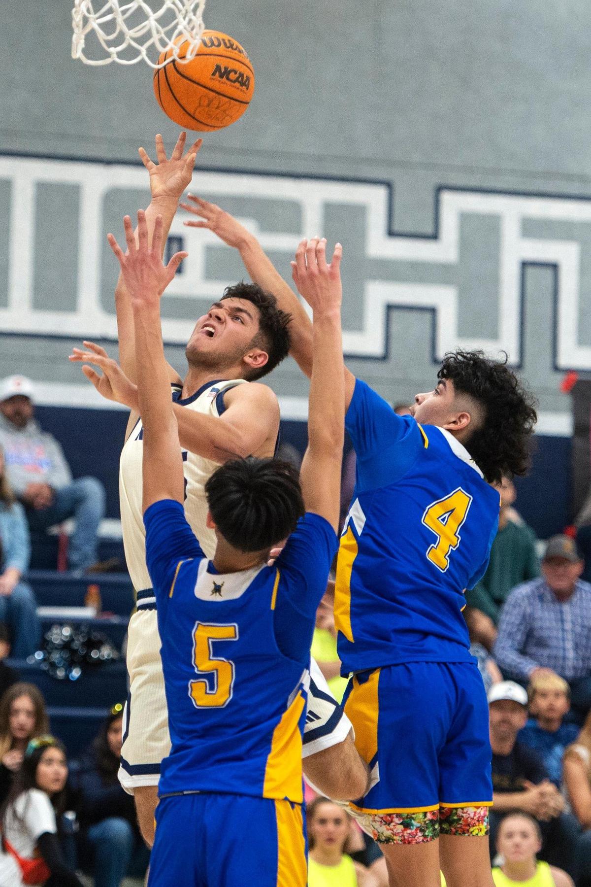 Stone Ridge Christian junior Kassius Salazar (15) attempts a layup during a NorCal Regional playoff game against Point Arena at Stone Ridge Christian High School in Merced, Calif., on Wednesday, Feb. 28, 2024. The Knights beat the Pirates 78-67.