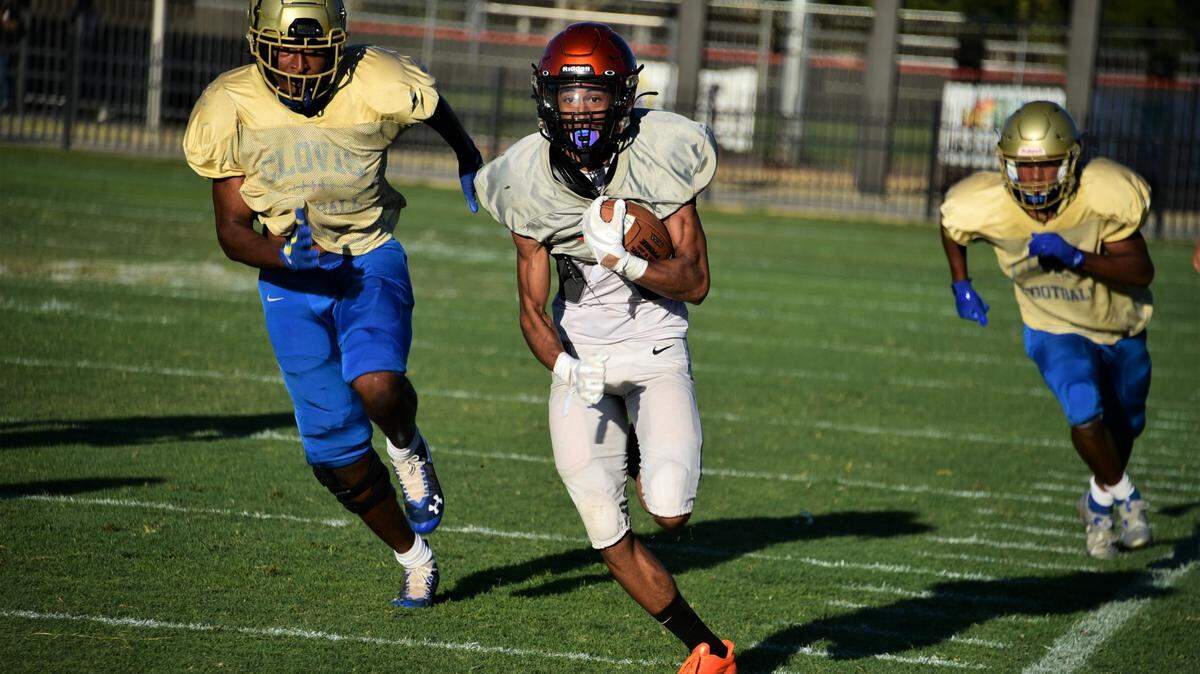 Mercred High School receiver Cristian Castro runs for a long touchdown during a scrimmage against Clovis on Friday, Aug. 12, 2022 at Cathie Hostetler Stadium.
