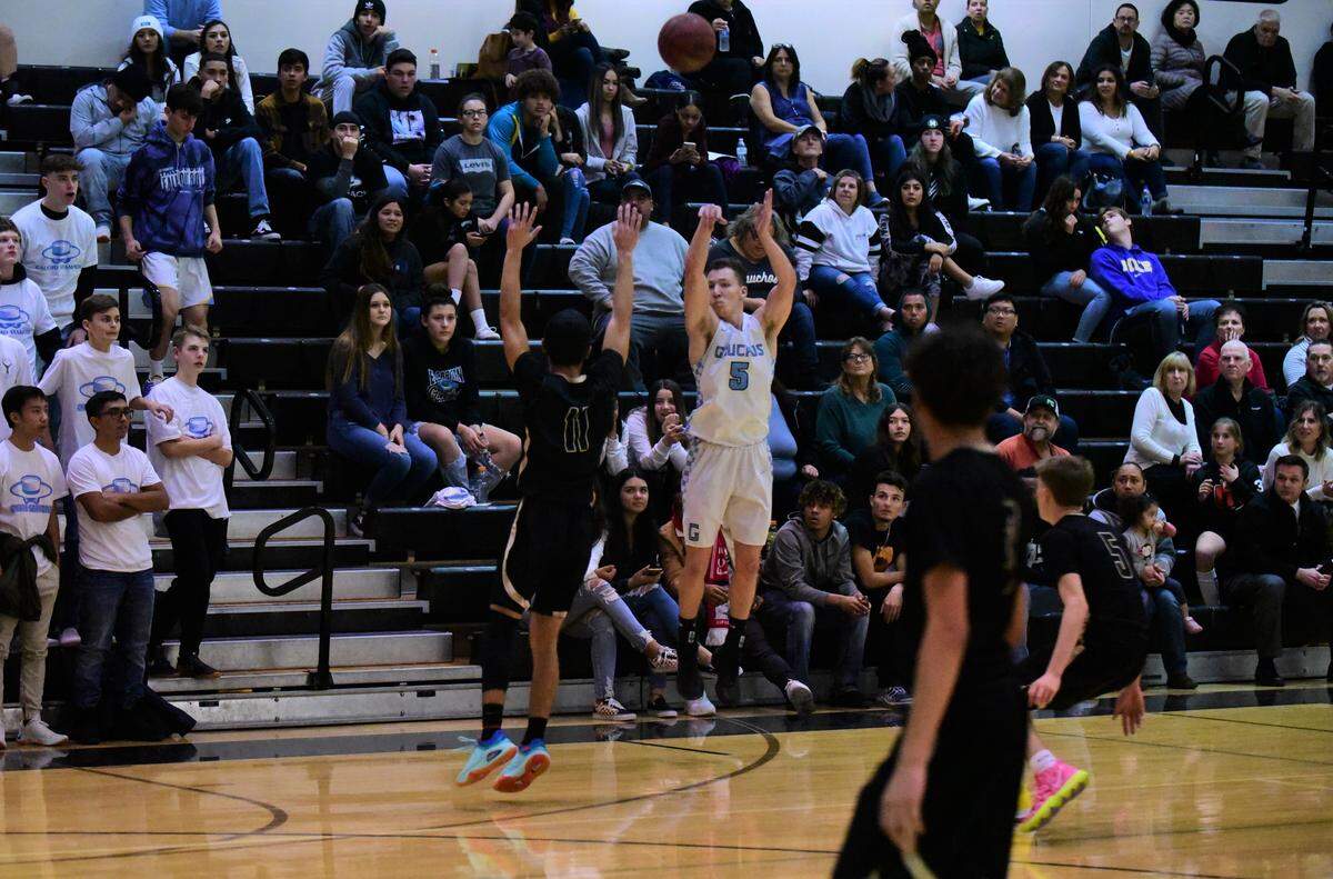El Capitan High senior Dillon Green shoots a 3-pointer against Buhach Colony during a game on Wednesday, Jan. 8, 2020.