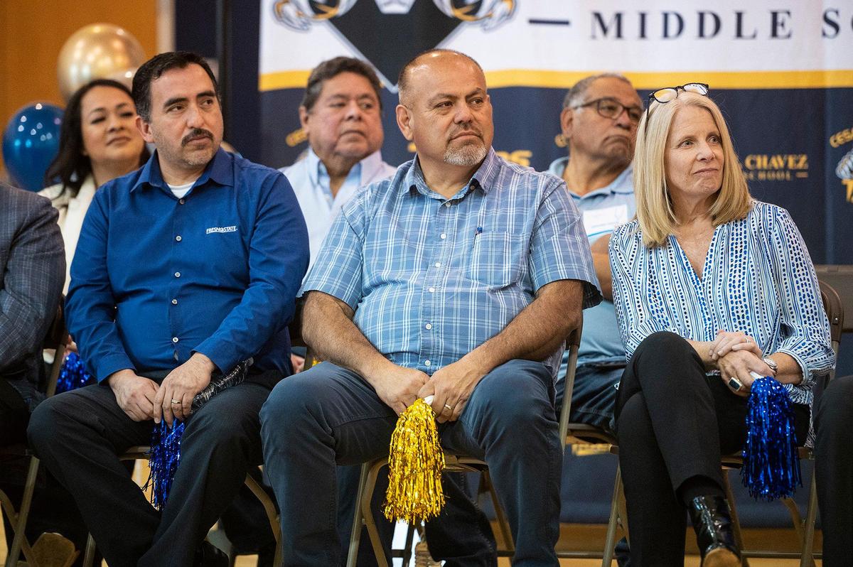 Merced County District 1 Supervisor Rodrigo Espinosa, center, looks on during a ceremony announcing a $4.5 million investment by Comcast to bring high-speed internet and broadband services to the area, at Cesar E. Chavez Middle School in Planada, Calif., on Monday, April 17, 2023. According to Nathan Ahle, Comcast Director of Government Affairs for the South Valley, the $4.5 million investment involves extending the existing network from nearby Merced into the town of Planada.
