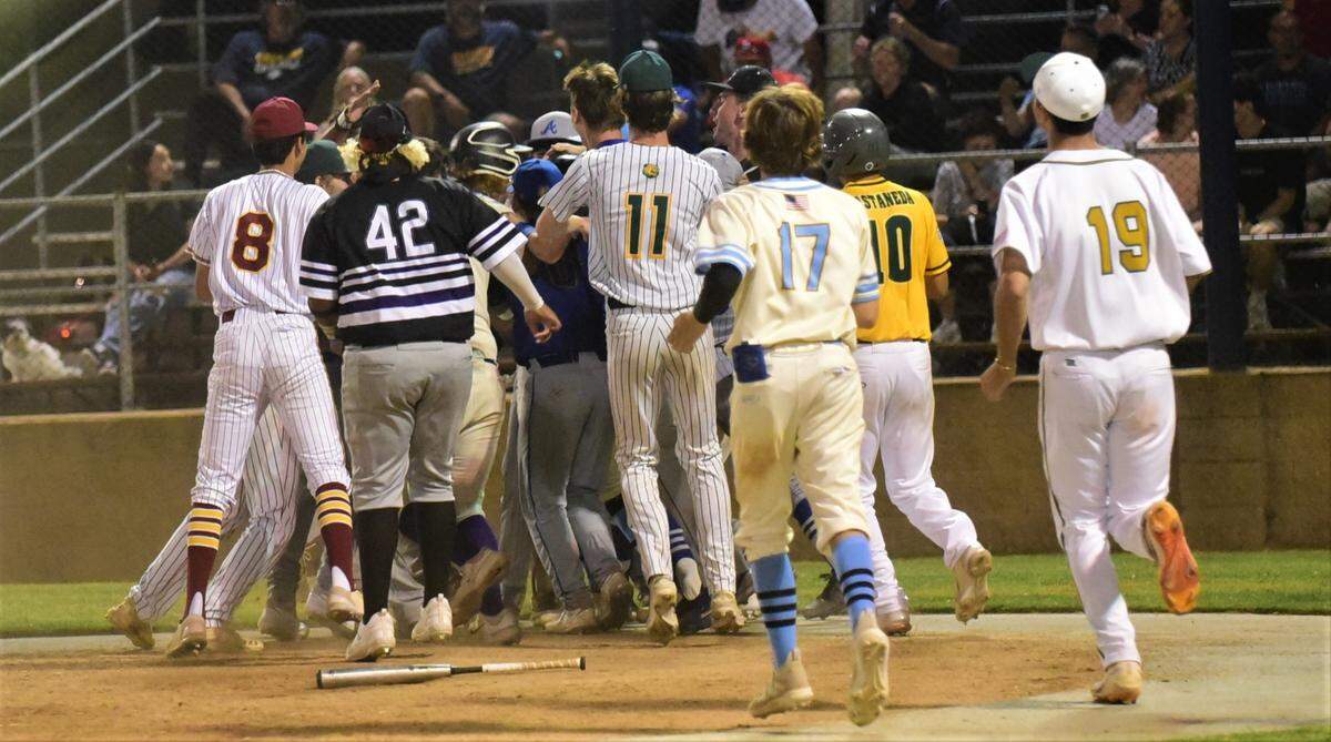 The Merced County All-Stars celebrate their 7-6 victory over Stanislaus County after scoring three runs in the ninth inning of the County Clash All-Star Game at Merced College on Saturday, June 17, 2023.