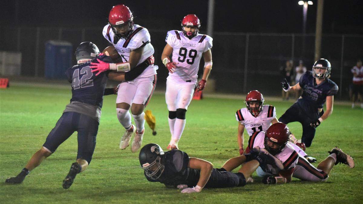 Stone Ridge Christian senior Hector Esquivez tackles Woodland Christian’s Billy Hinkle during a game on Saturday, Sept. 10, 2022 at Castle Field.
