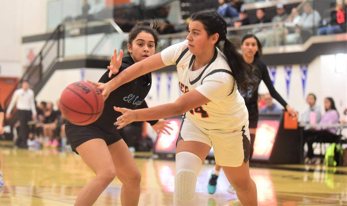 Merced High School freshman Samantha Barragan (24) passes the ball during a game against El Capitan on Tuesday, Jan. 3, 2022 at Merced High School.