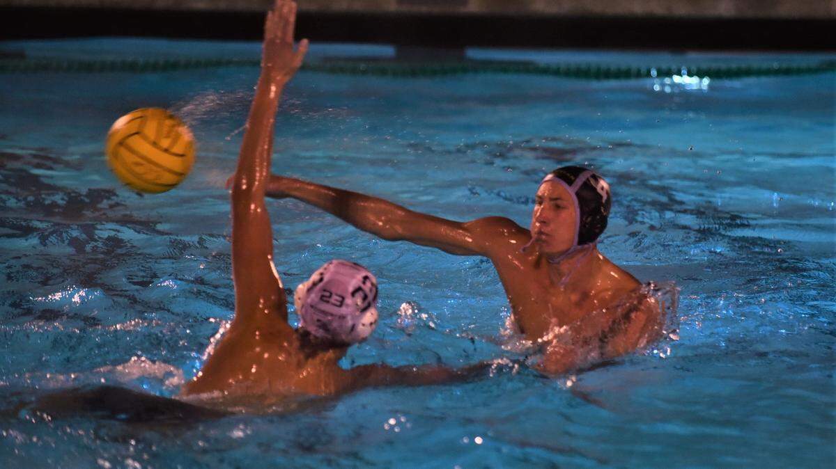 El Capitan High School’s Michael Brown shoots around a Woodcreek defender during a playoff game on Wednesday, Nov. 9, 2022 at El Capitan High School.