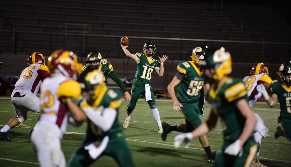 Mariposa sophomore quarterback Wyatt Green delivers a pass during the Northern California Regional Division 7-AA Championship on Friday, Dec. 6, 2019 at Veterans Stadium in Merced, Calif.