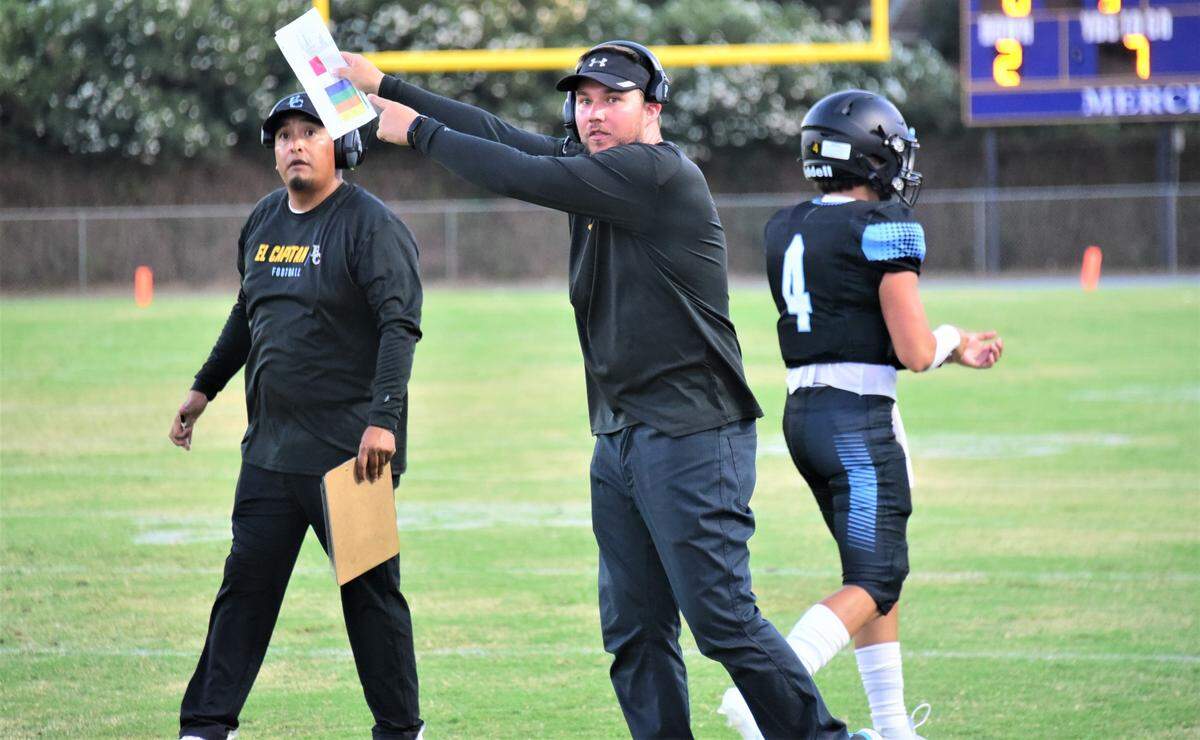 El Capitan High School head football coach Jordan Irsik attempts to get the attention of an official during a game against Cordova on Friday, Aug. 25, 2023 at Merced College’s Stadium ’76.