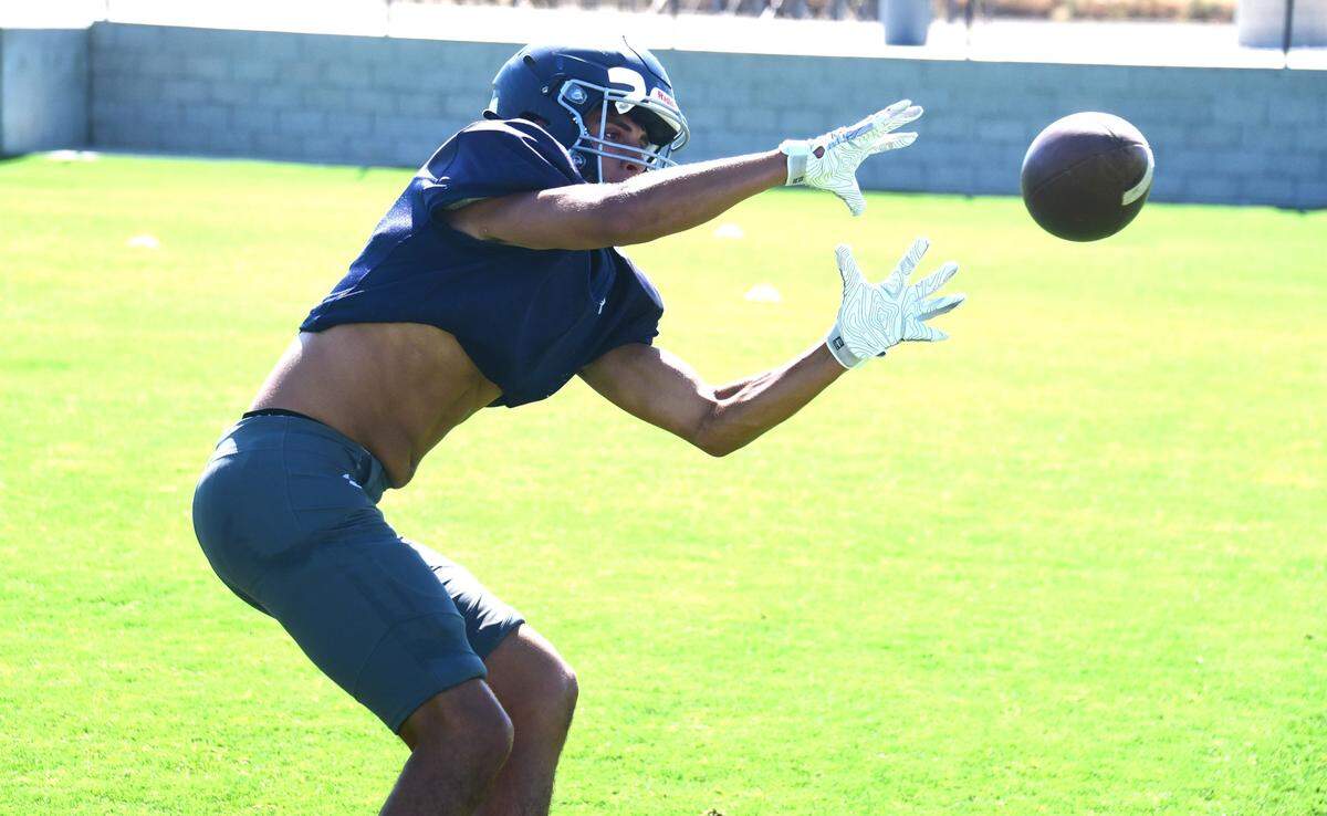Stone Ridge Christian senior Carson Lund hauls in a pass during practice on Wednesday, Aug. 7, 2024.