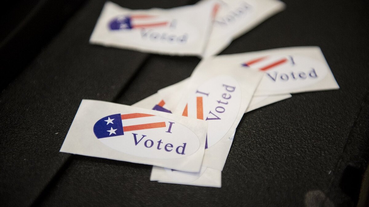 Stickers wait to be handed out to voters at the Merced County Administration Building in Merced, Calif., on Tuesday, June 5, 2018.