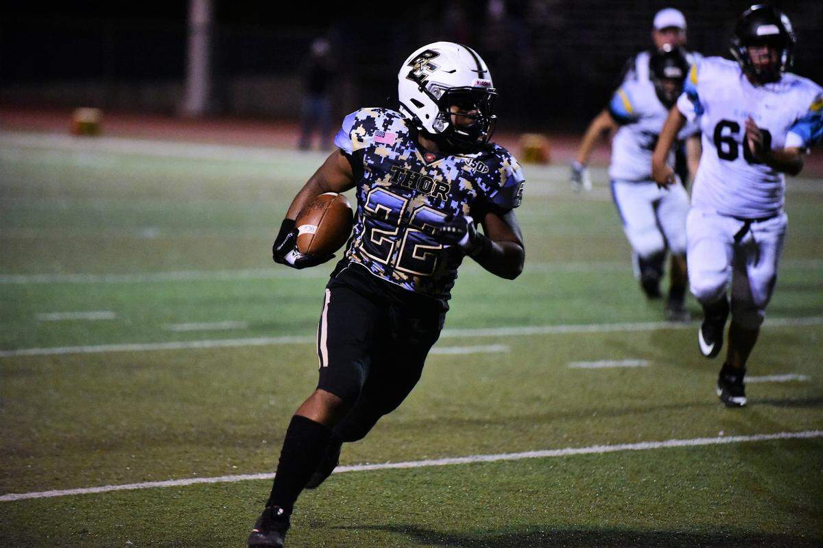 Buhach Colony running back Anthony Berry runs up field during the Thunder’s 64-0 win over El Capitan on Thursday, Oct. 3, 2019 at Dave Honey Stadium in Atwater, Calif.