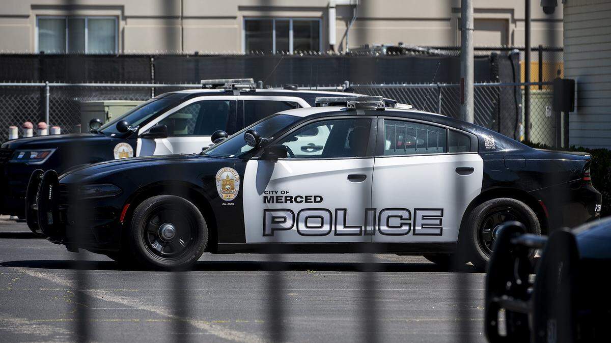 Merced Police Department patrol vehicles parked in the department lot in Merced, Calif., on Tuesday, April 12, 2022.