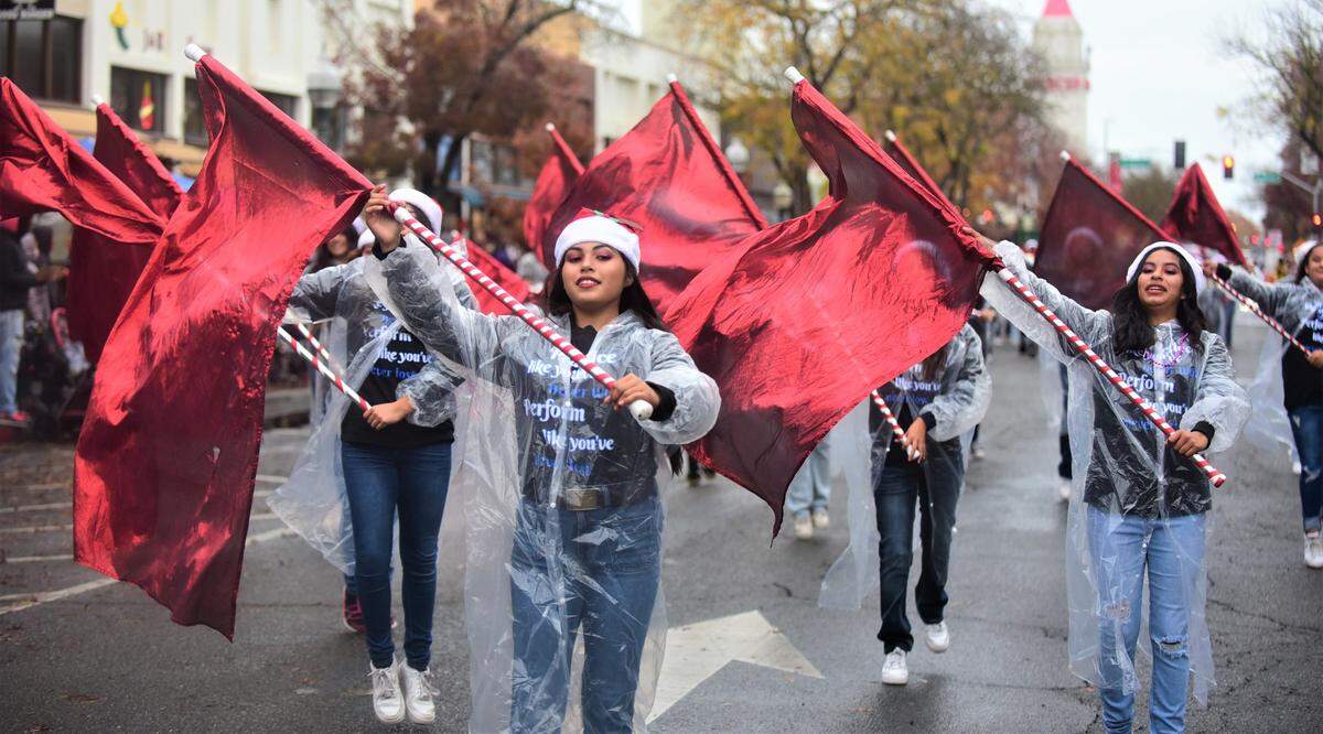 The Tenaya Middle School color guard performs during the Merced Christmas Parade on Saturday, Dec. 3, 2022.