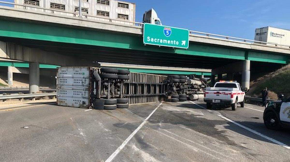 A big rig overturned at about 1:20 p.m. and was still blocking the slow lane of the two-lane highway about two hours later, the California Highway Patrol said. The highway is commonly used by commuters on their way back from the Bay Area.