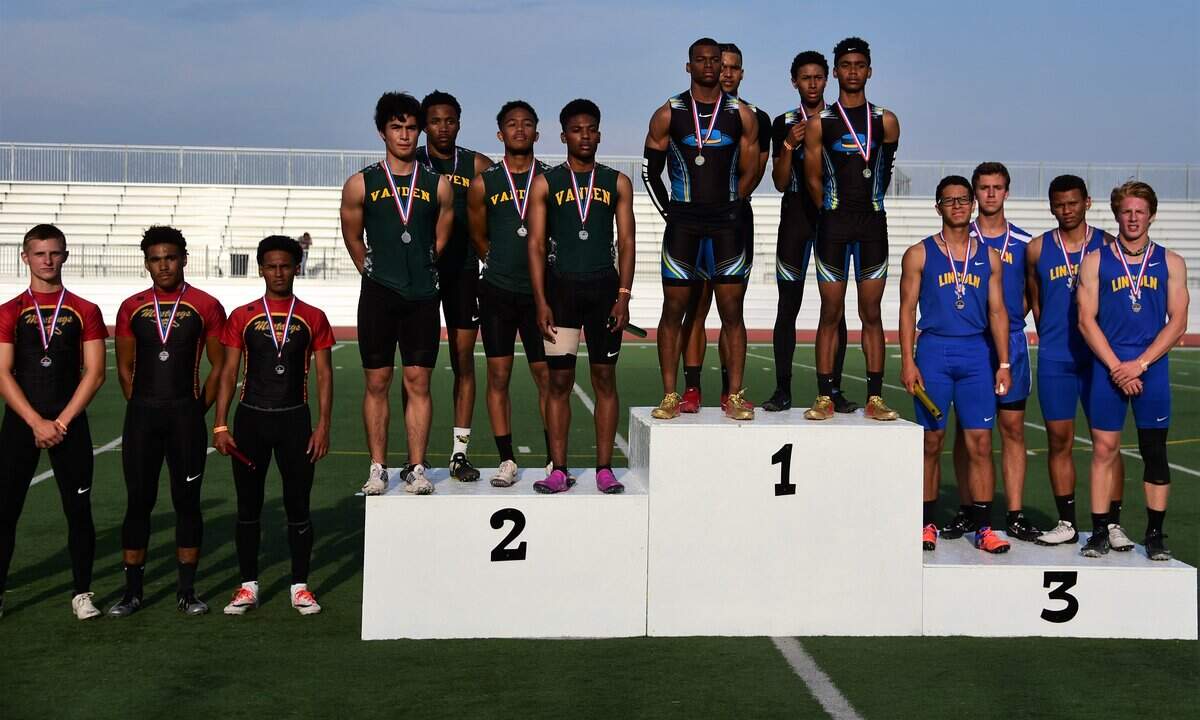El Capitan’s 4x100 relay team stands atop the podium after winning at the Sac-Joaquin Section Division III championships.