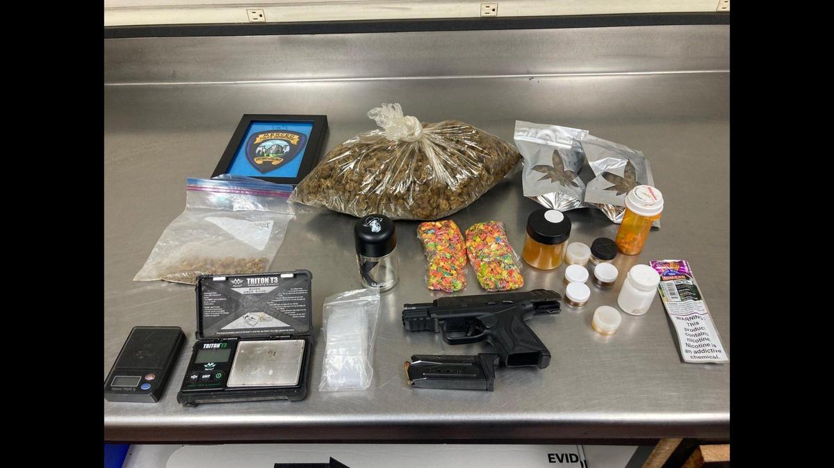A Merced traffic stop on Thursday, led to the arrest of two suspected gang members after an officer located a gun and drugs, according to the Merced Police Department. Image courtesy of Merced Police Department.