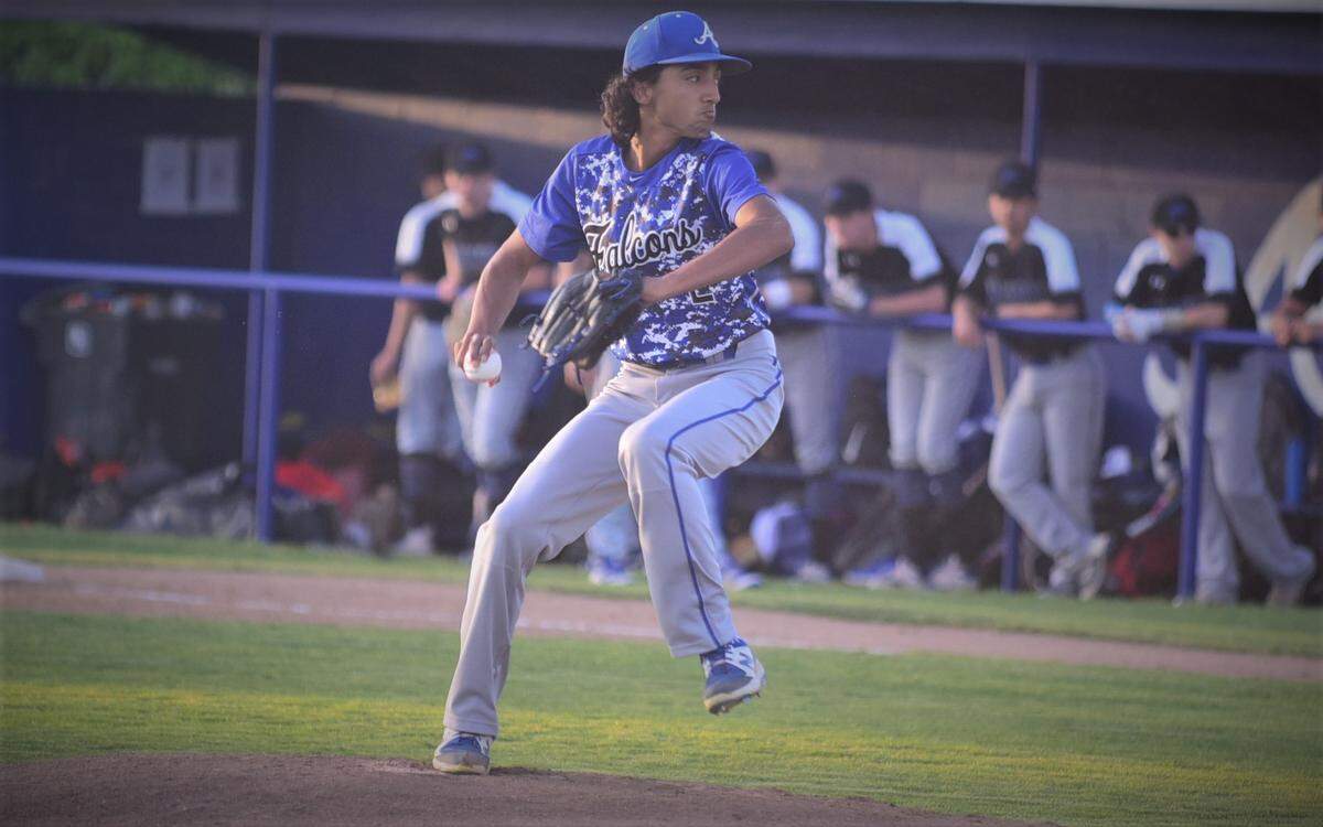 Atwater High senior Damian Romo delivers a pitch during the first inning of a game against Mountain House on Tuesday, April 19, 2022 at Memorial Ballpark in Atwater, Calif.