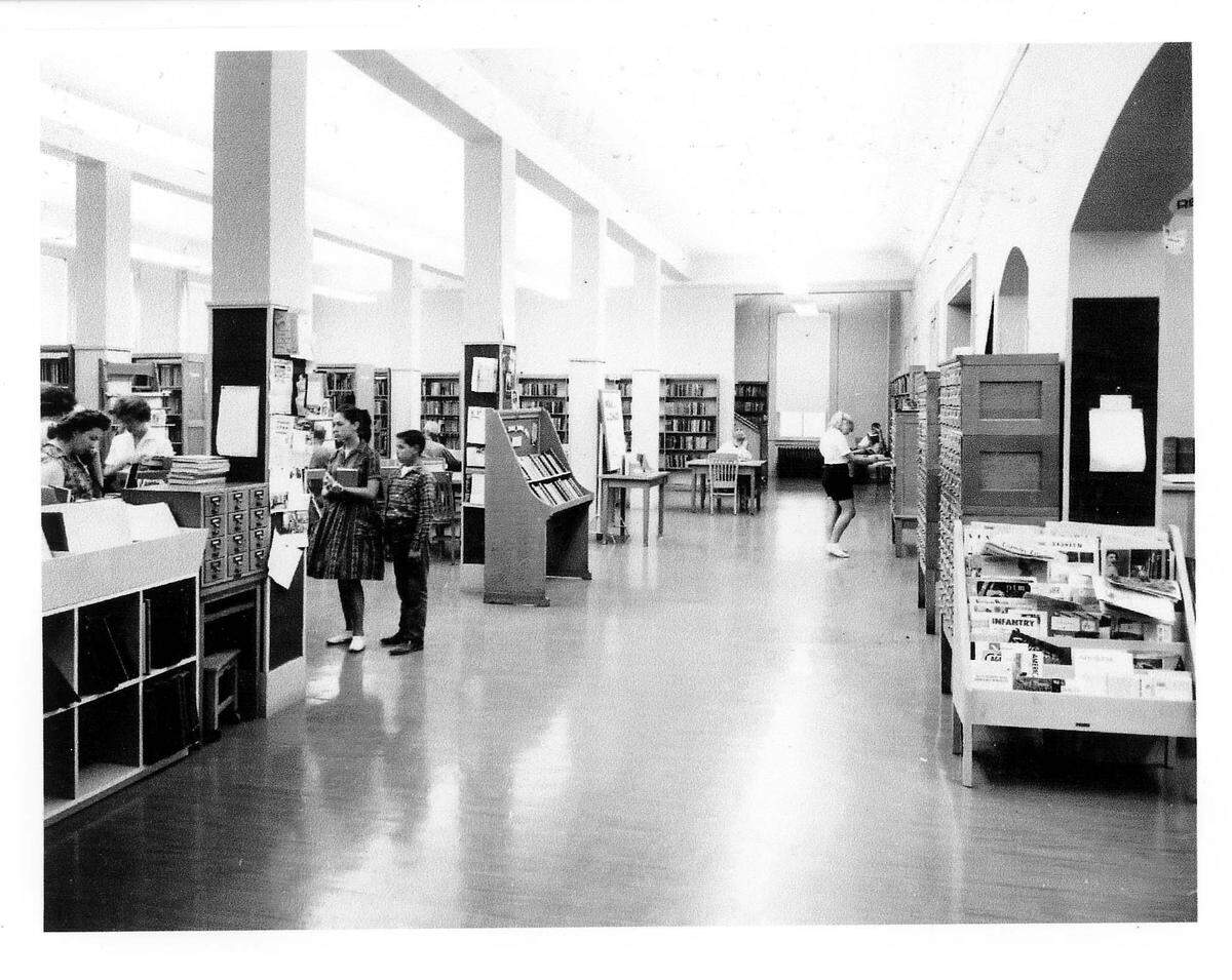 An image of the old Merced County Library located in the historic building at 2125 M Street built in 1897 and designed by Louis Starwood Stone in the Richardsonian Romanesque style. Image courtesy of Merced County Historical Society.
