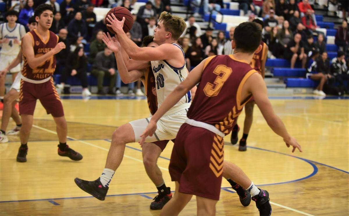 Atwater High senior Tyler Parr (10) drives through the lane during a game against Golden Valley on Friday, January 6, 2022 at Atwater High School.
