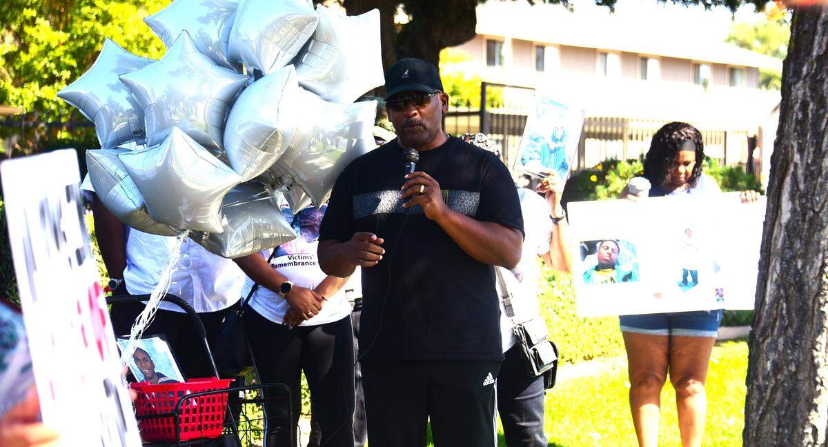 Pastor Allen Huddleston offers a prayer during the 14th annual Riley Brothers Victims Remembrance Walk on Saturday, Oct. 14, 2023, in Merced, Calif.