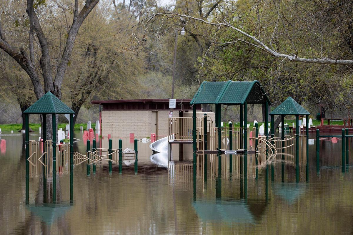 A flooded section of Hagaman Park as the Merced River remains above flood stage in Livingston, Calif., on Sunday, April 2, 2023.