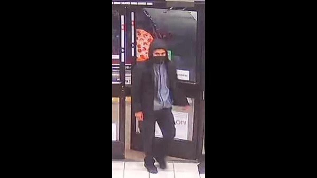 Authorities are looking for a suspect accused of entering a Los Banos 7-Eleven with a handgun and robbing the story of cash on March 10, according to the Los Banos Police Department. Police described the suspect as about 5-feet-8 inches tall with a thin build. Image courtesy of Los Banos Police Department.