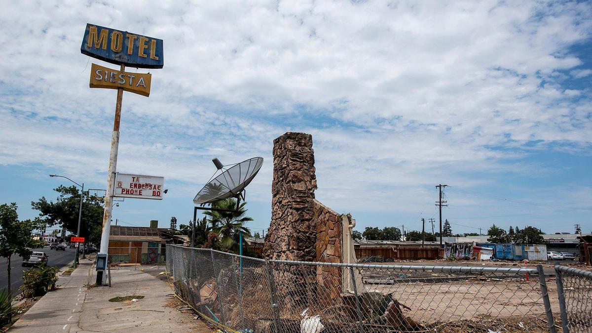 Debris scattered across the site where Siesta Motel buildings have been demolished at 1347 W. 16th Street in Merced, Calif., on Thursday, Aug. 4, 2022.