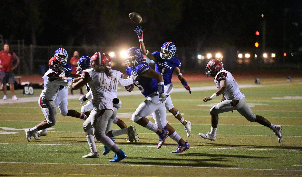 Atwater’s Daniel De La Rosa throws a pass into the end zone during a game against Patterson on Friday, Oct. 4, 2019.