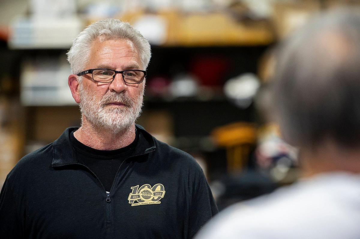 Dan McNamara, owner of McNamara Sports, speaks about the history of the business at its 437 W. 18th Street location in Merced, Calif., on Monday, May 8, 2023. The family owned store which sells athletic equipment, team uniforms, business apparel and offers screen printing and embroidery services, is celebrating 100 years in business