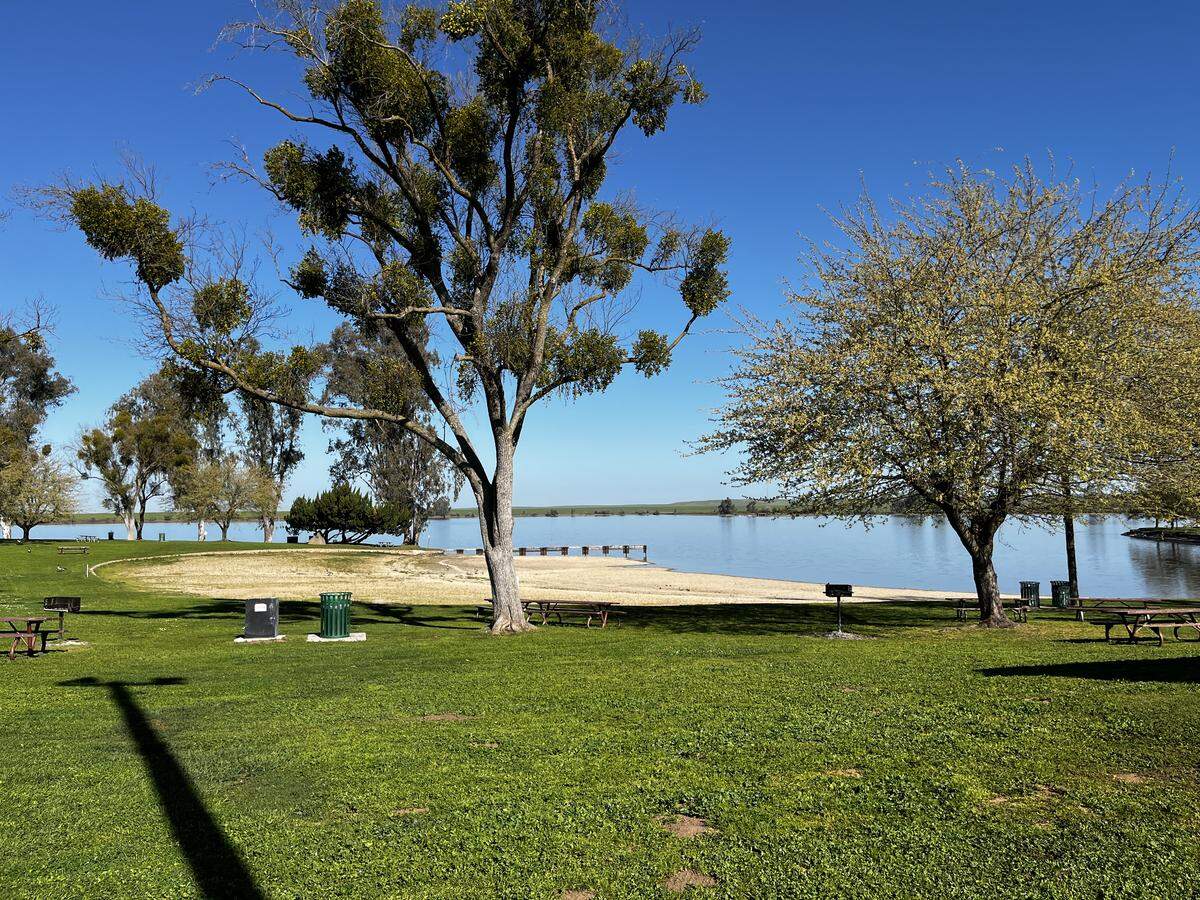 The beach at Lake Yosemite is pictured.