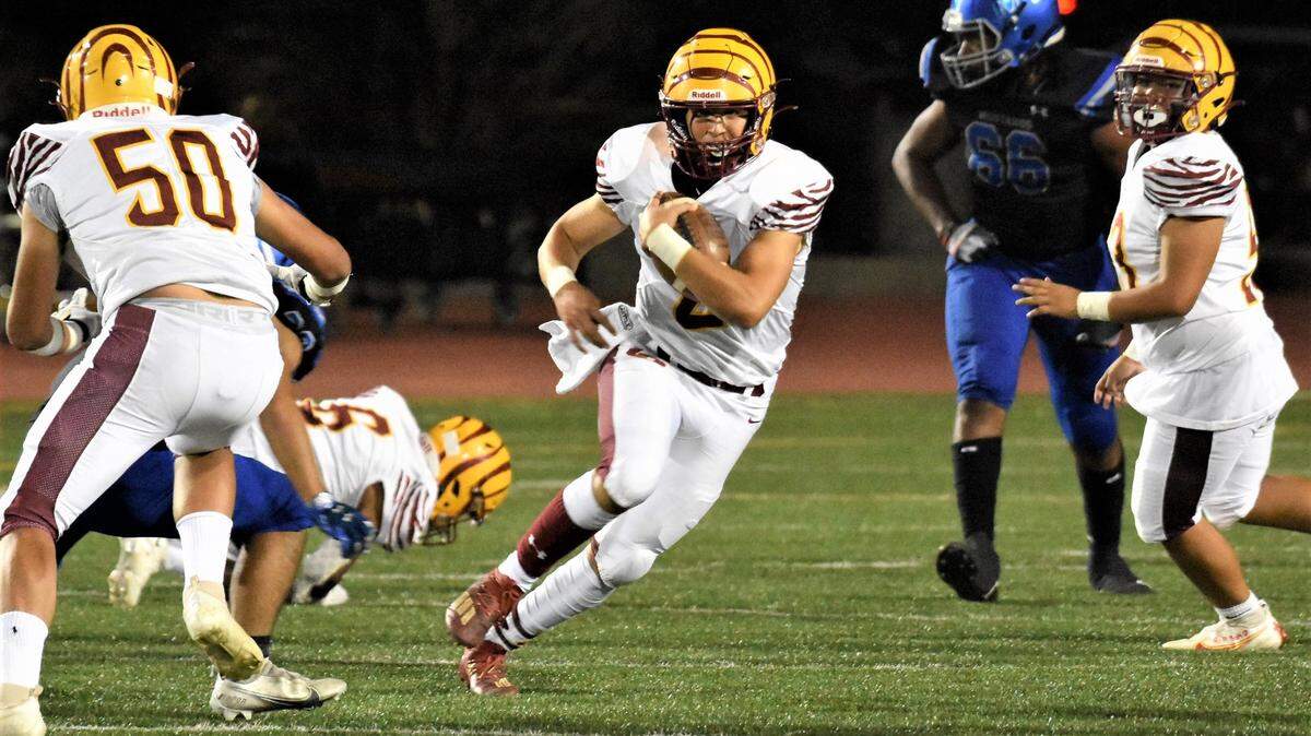 Los Banos High School quarterback David Herrera was named the Western Athletic Conference Offensive Player by the conference coaches after leading the Tigers to a WAC championship.