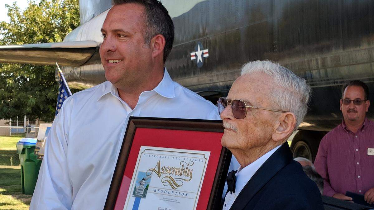 Assemblyman Adam Gray (left) poses for photos with veteran Peter “Scotty” Burns during the Veterans Advisory Committee meeting at Castle Air Museum in Atwater on Thursday, Sept. 26, 2019.