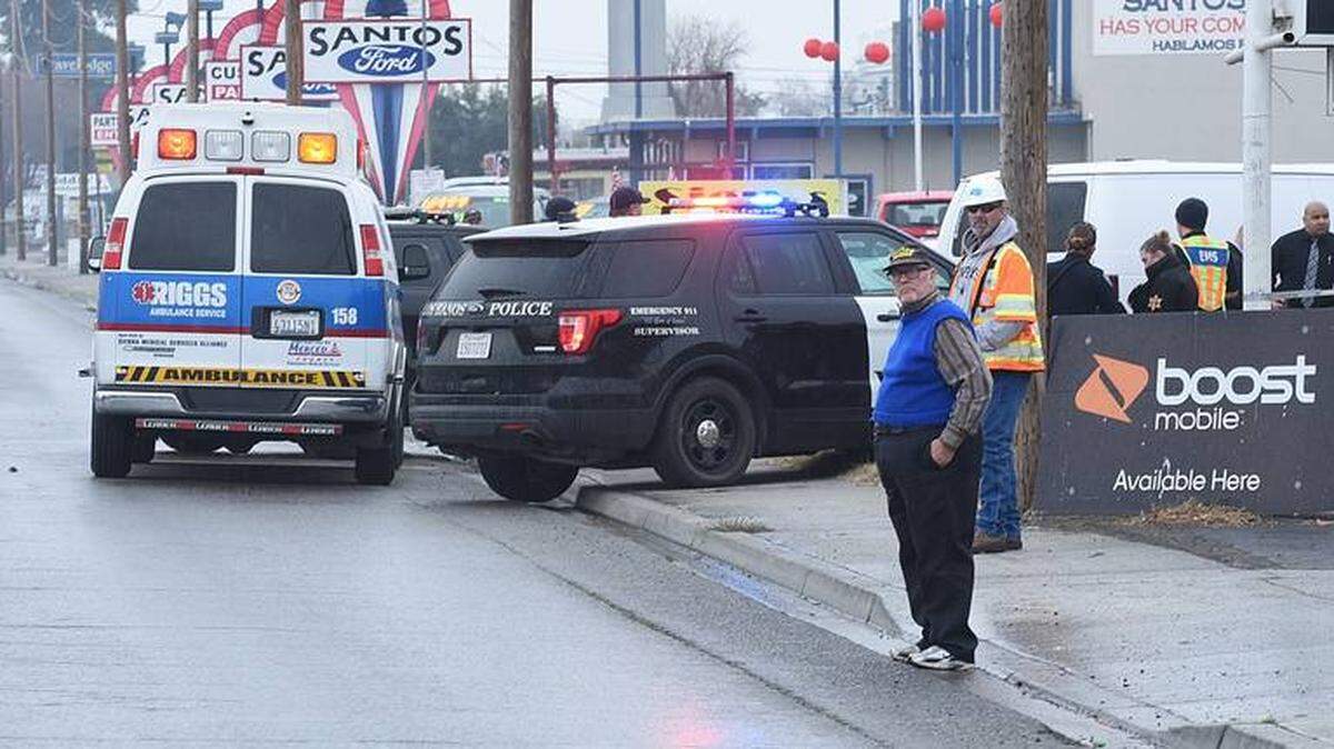 Los Banos police and a Riggs ambulance respond to the scene of a fatal multi-vehicle crash in which a motorcyclist died Wednesday, Jan. 3, 2018, in the 600 block of Pacheco Boulevard in Los Banos.