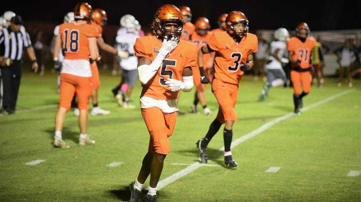 Merced High junior running back Chase Smith returns to the Bears sideline after scoring his four rushing touchdown during a 56-14 win over Central Valley on Friday, Oct. 21, 2022 at Cathie Hostetler Stadium at Merced High School.