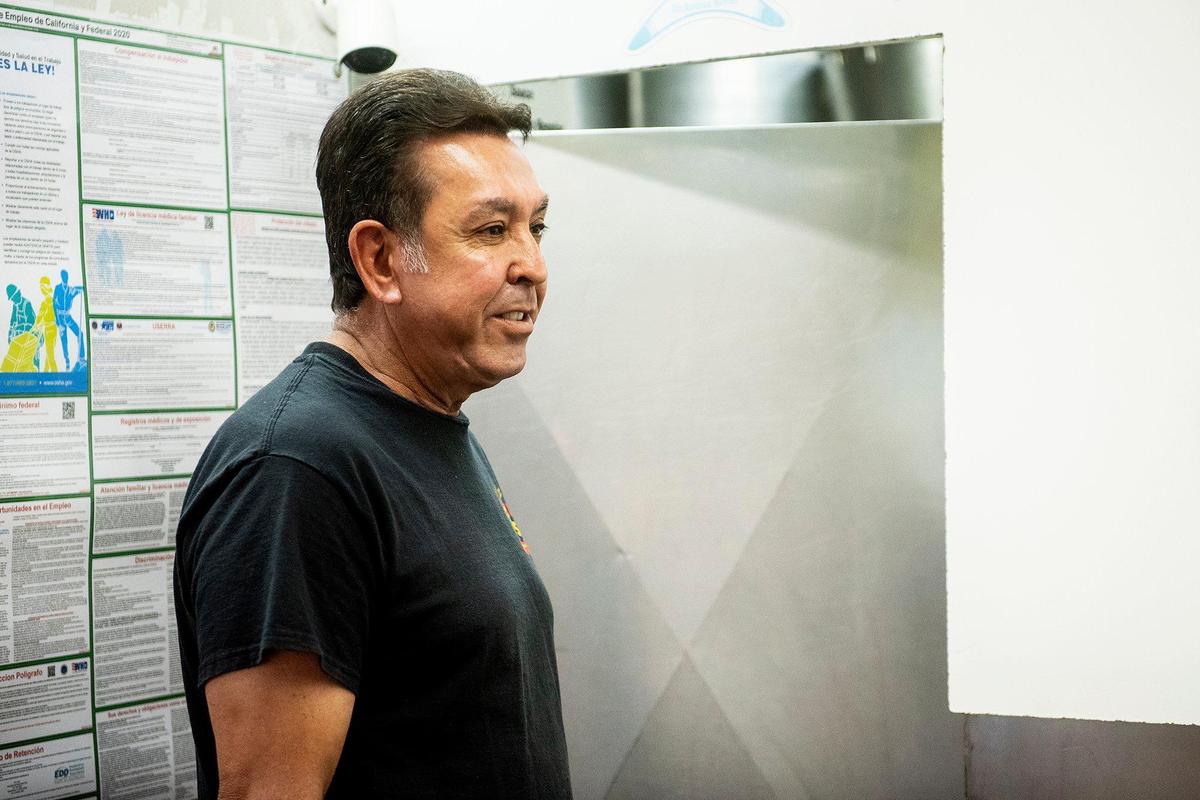Enrique Valencia, 67, owner of Maria’s Taco Shop, speaks with an employee at the restaurant’s 1750 R Street location in Merced, Calif., on Tuesday, Oct. 15, 2024. The restaurant which is open 24 hours, has offered authentic fast Mexican food to the Merced community for 32 years.