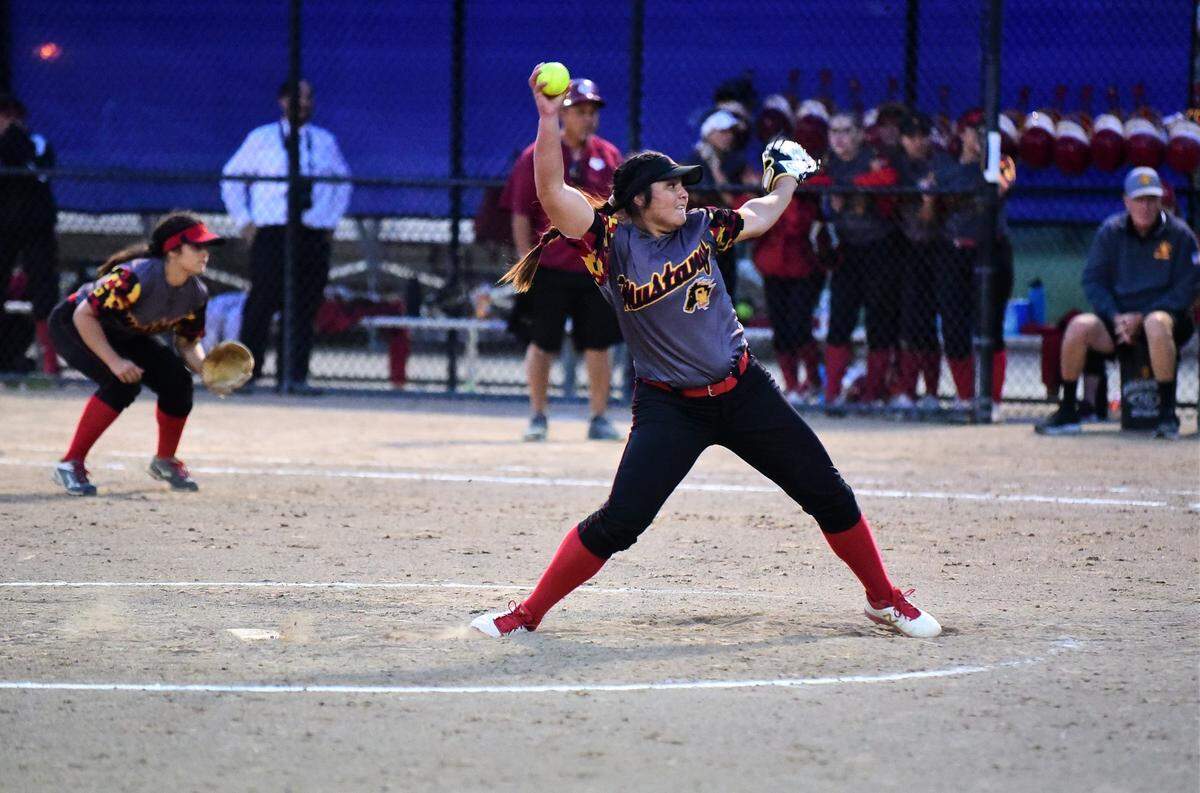 Oakdale pitcher Lexie Webb delivers a pitch during the Sac-Joaquin Section Division III championship game. Oakdale defeated Golden Valley 3-2, 12-2 to win the championship.