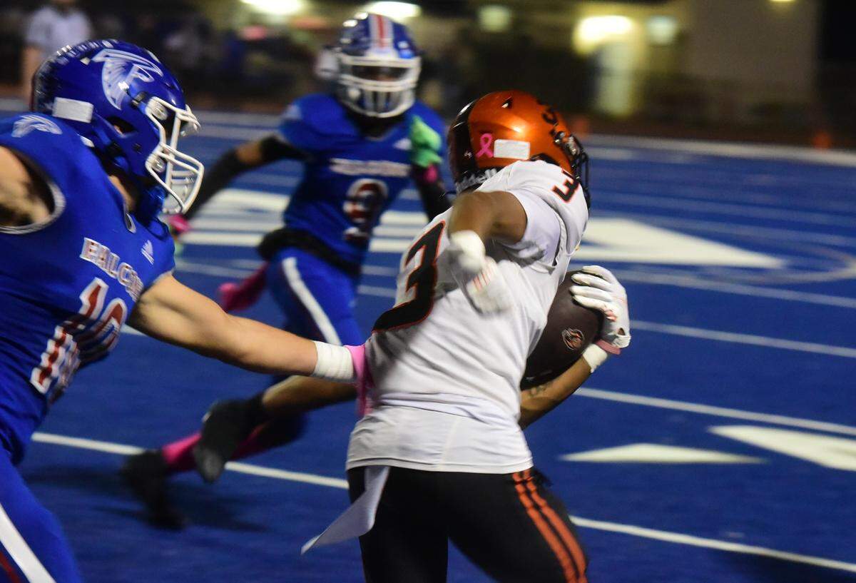Merced High receiver Jordan Dupree (3) runs up the field after catching a pass during a game against Atwater on Friday, Oct. 26, 2024.