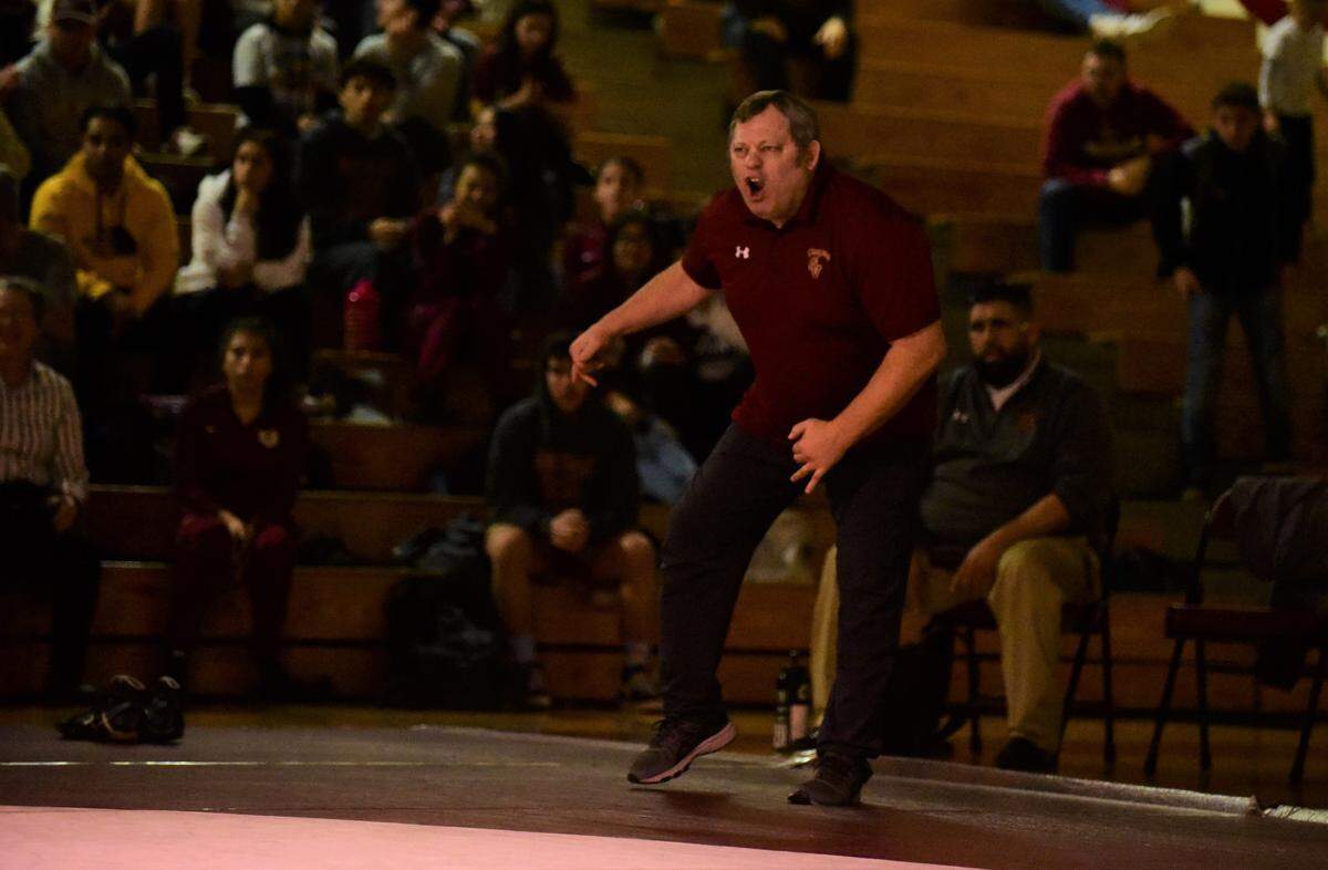 Golden Valley coach Chopper Mello reacts during a match against El Capitan on Tuesday, Jan. 28, 2020 at Cougar Arena. The Cougars won 37-27 to improve to 6-0 in the Central California Conference.
